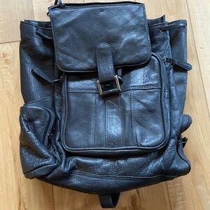 Rare Leather Back pack . Color is black . Brand is Latico .